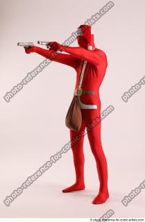 JOEL_ADAMSON CHRISTMAS VILLAIN WITH TWO GUNS